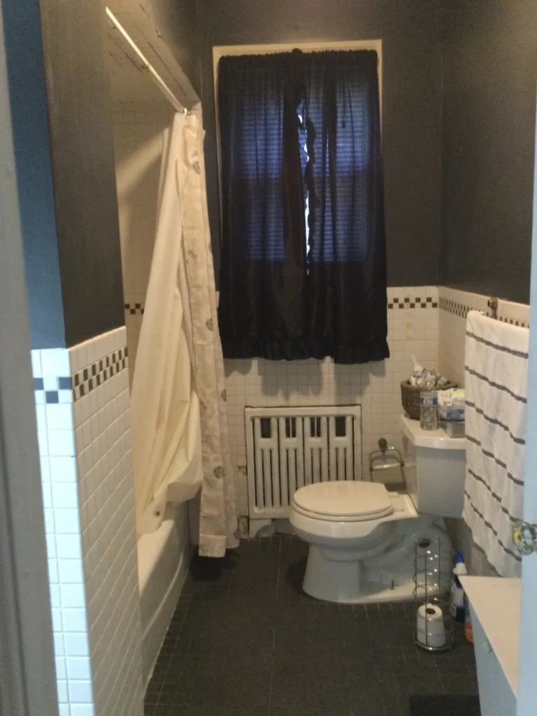 Full Bathroom Renovation with White Subway Tile Tub Surround, Marble-Top Shaker Vanity, and Wood-Look Porcelain Flooring in Union, Union County, NJ